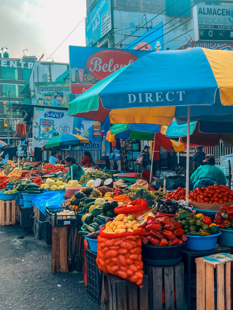 a photo of a fruit and veg stand at Mercado La Democracia in Xela, Guatemala