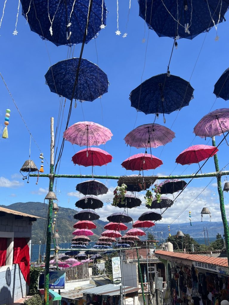 photo of colourful umbrella decorations in San Juan, Lake Atitlan