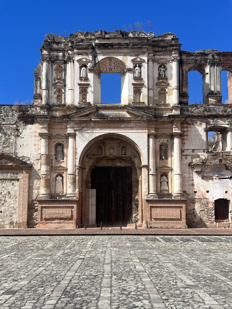 photo of ancient ruins with clear blue sky in Antigua