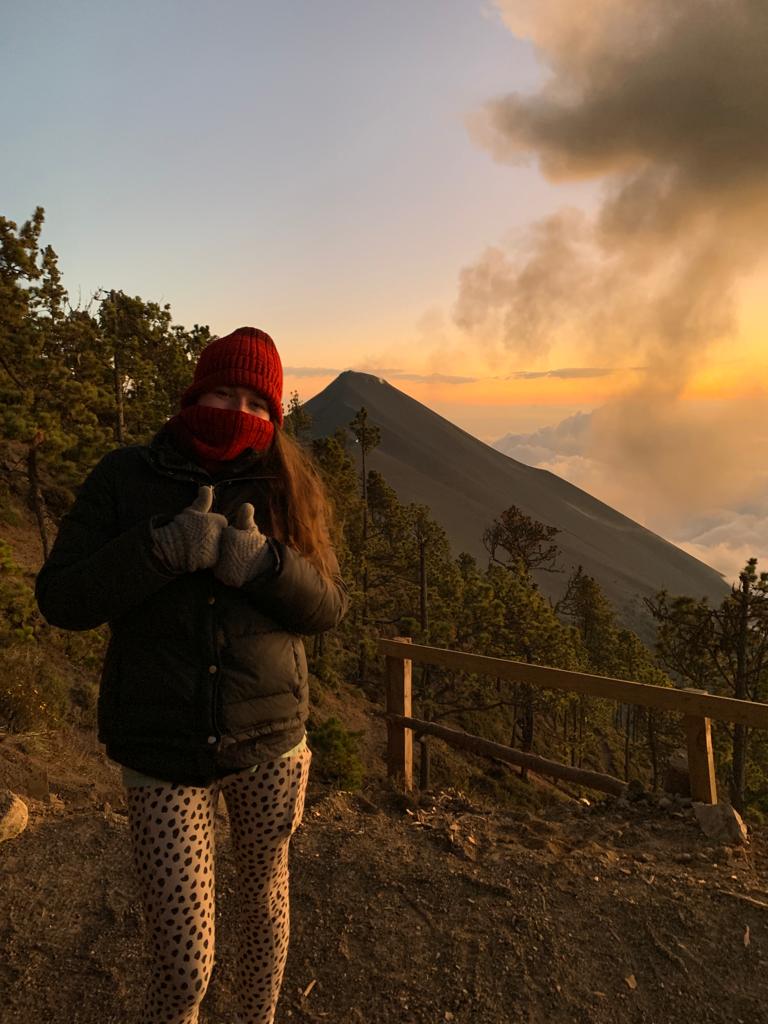 A photo of me in the early hours of the morning with Volcano Fuego in the background