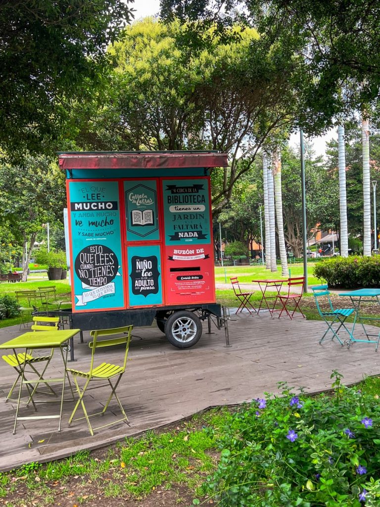 parque 93's mobile bookstore with seating surrounding it