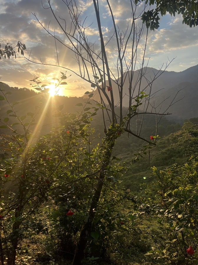 photo of the sun rising in the sierra nevada de santa marta