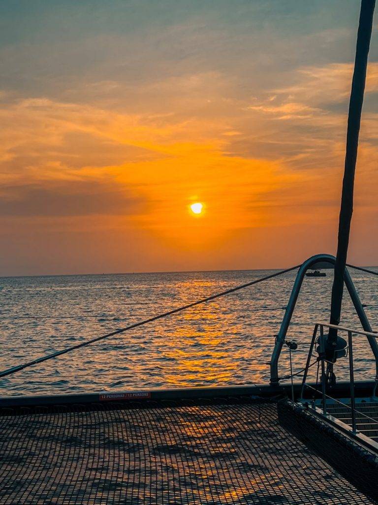 photo of sunset from a catamaran