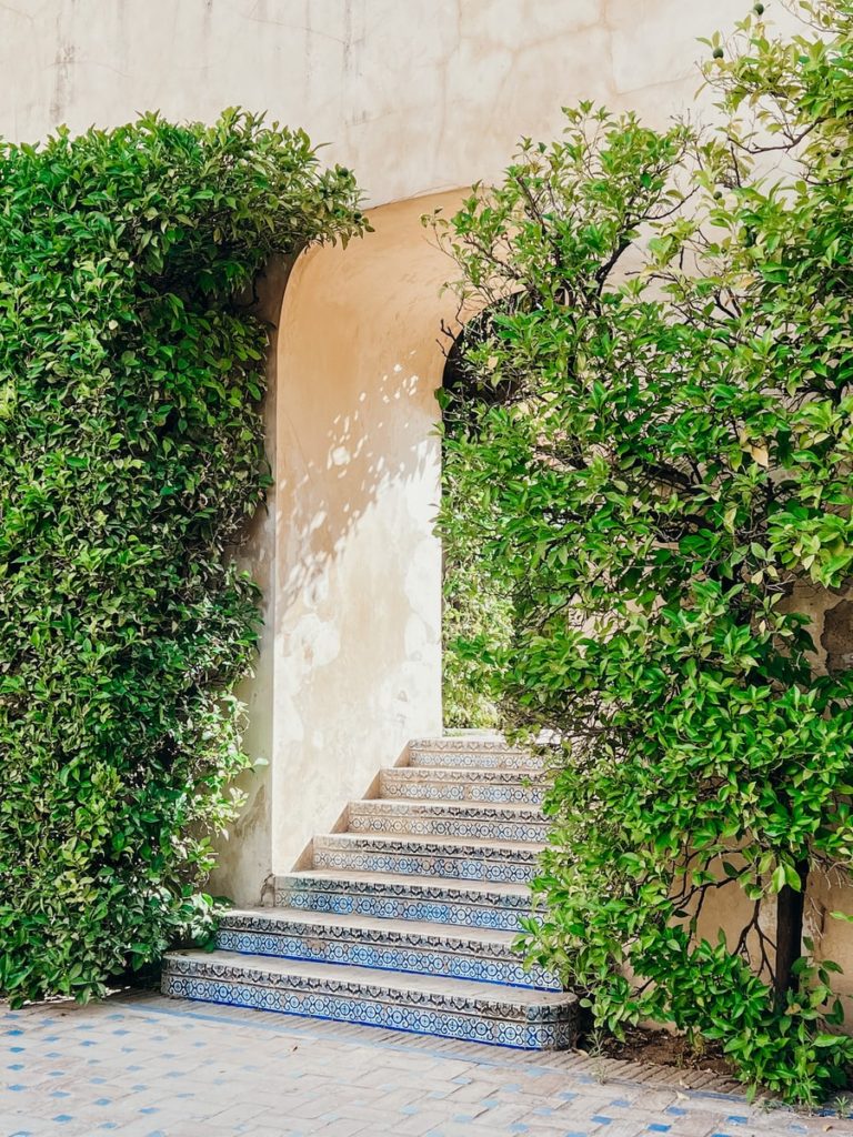 photo of archway in Alcazar gardens Sevilla, Spain